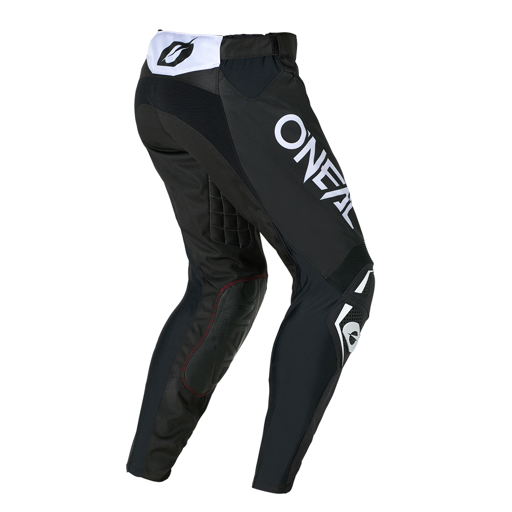 O'NEAL HARDWEAR Pants ELITE in Schwarz mit weißem "O'NEAL"-Schriftzug, gepolsterten Knien und verstärkten Bereichen, von hinten und von der Seite dargestellt.
